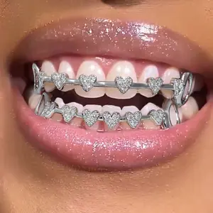 2pcs Love Connection Side Hollowed-out Grillz Copper Inset Zirconia Hip Hop Jewelry Grillz Cool Pop Party Gift Lady Grillz Oral grillz vampire Heart Shaped Brackets Unisex Bracelet Set Classic Magnetic Necklace black