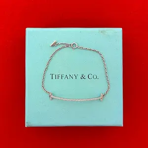 Pre-owned Tiffany & Co. 18K White Gold (Au750) Small Leather Goods Tiffany&Co. T Smile Au750 White Gold Diamond Bracelet