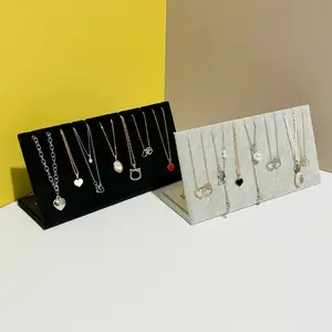 A Velvet Necklace Display Rack with 12 Slots, Made of Durable And Soft L-Shaped Material - a Jewelry Organizer for Home And Boutique Stores, Available in Black/Gray