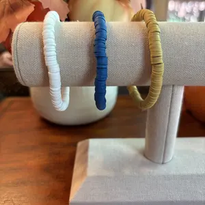 Blue, Gold, and White Clay Beaded Bracelet Stack