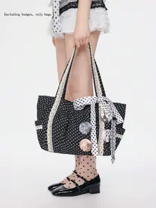 Small niche design fashionable retro polka dot tote bag, side pocket design, lace decorative details, casual and simple texture large capacity shoulder bag, can accommodate files, tablets, and personal items
