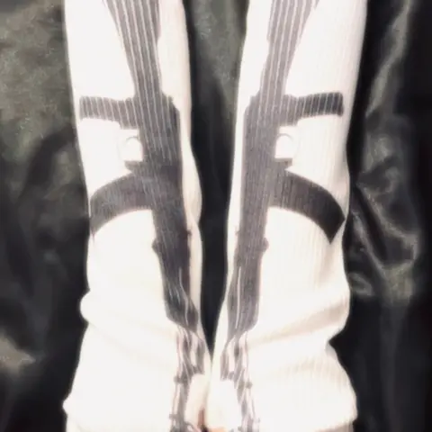 These Sweet & Savage long knit gloves feature an edgy gun print for a unique street style. Perfect for a steampunk inspired look or adding a rebellious touch Seamless knit gloves Gloves for winter