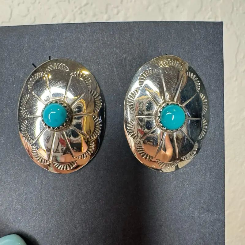 Zuni native made Concho earrings with turquoise stone