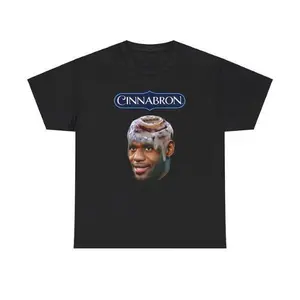Bring humor and style together with the Cinnabron LeBron James Meme T-Shirt. Made from pure 100% cotton, this unisex short sleeve tee offers comfort, breathability, and a relaxed everyday fit. The bold graphic features the trending Cinnabron LeBron James