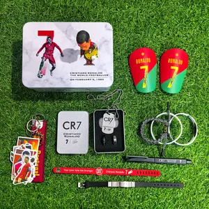 Ronaldo Gift Bundle(1 CR7 gift box+1 Keychain+1 Figure+1 Pen+1 Necklace+2 Rings+1 Pair Of Mini Shin Guards+5 wristbands)