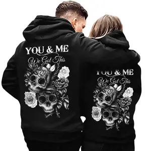 You and I, we have these matching couple hoodies with a skull and rose design GARMENTARY