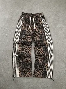 Unisex style, streetwear-inspired fashion striped and leopard-print Bold Patterns drawstring waistband joggers. A versatile summer fashion item that pairs well with various outfits. Stylish, trendy, hip-hop, sports, and hip-hop dance. Jogging Pants