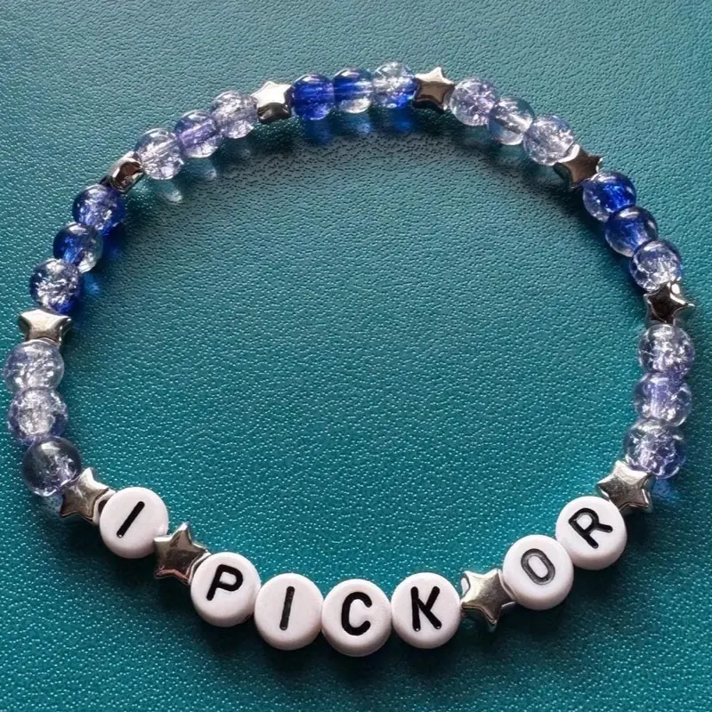 I pick or. Scott Hunter and Kip Grady. Beaded friendship bracelet.