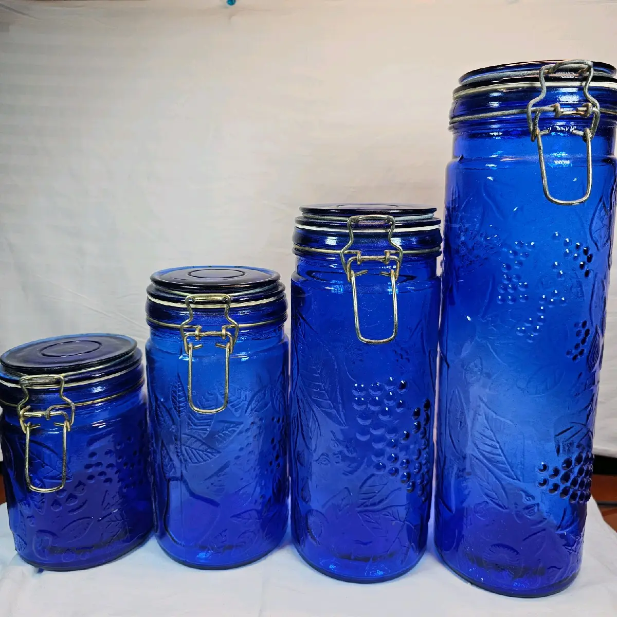 Vintage Set of Four Cobalt Blue Canisters Vintage Set of Four Cobalt Blue Canisters