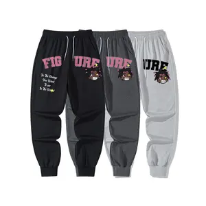 Relaxed Fit Men's Ribbed Hem Joggers Highlighted by the Distinctive FIGURE Doodle Print and the Complete Inspirational Slogan "Be The Change You Want To See In The World" for a Thoughtful Wardrobe Addition