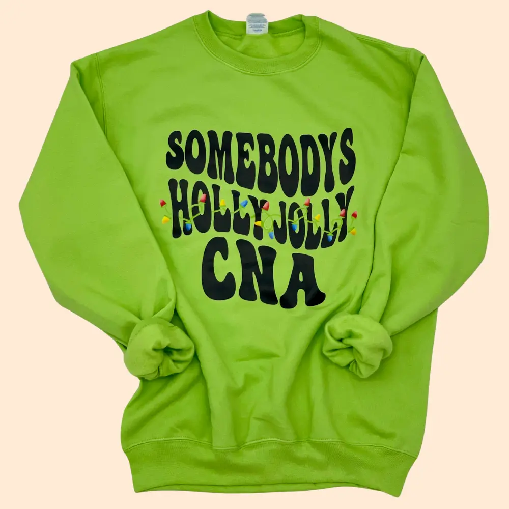 Somebodys Holly Jolly CNA Crewneck Sweater - Women, Womenswear, Holiday, Christmas, CNA, Healthcare, Festive, Tacky Sweater