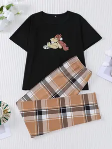 2 pieces of men's, women's, and children's printed round neck short sleeved pants and pajamas set with elastic waistband suitable for all seasons of leisure, comfort, and cute home wear