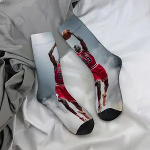 Basketball player's aerial shooting motion; mid-calf socks, casual sportswear style - soft and comfortable.