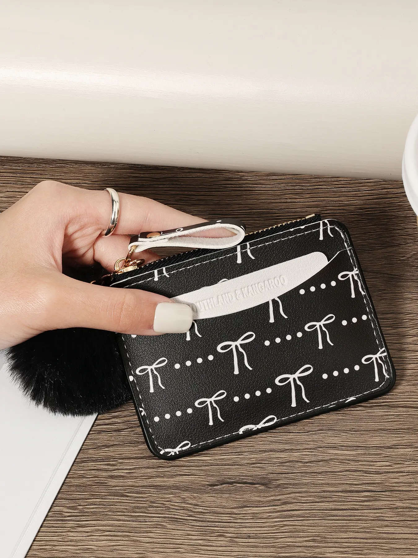 Adorned with a Delicate Pom-pom, Bow print zipper is lightweight and portable for ID cards, credit cards with multiple card slots, and women's card bags suitable for outdoor activities, travel, and returning to school