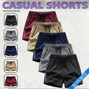 5 men's casual sports shorts -wrinkle-resistantpolyester blend fabric,loose fit with drawstringwaistband,solid color, suitable for the gym, outdooractivities, and everyday wear,simple designlsmoothtexture
