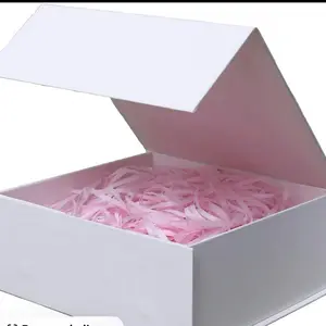 Oro Laminado Open Your Box with Pink Shredded Paper for Elegant Gift Wrapping Perfect for Special Occasions