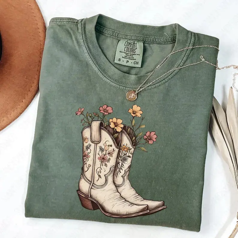 Comfort Colors Western T-Shirt featuring cowgirl boots and cowboy graphics, perfect for horse girls, rodeo lovers, and anyone who loves western style fashion.