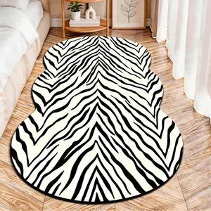 2D Flat velvet irregular rug with classic black and white zebra print pattern, machine washable non-slip carpet for bedroom, all seasons & holiday decor, durable & easy to clean.