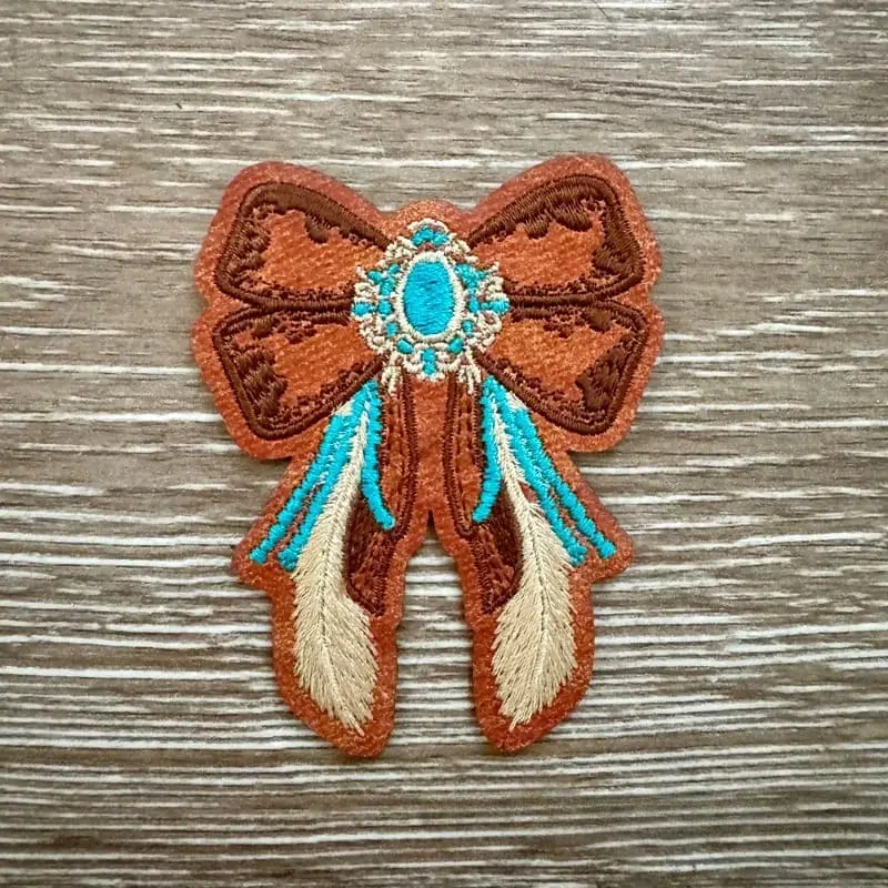 Fancy Western Turquoise Bow Leather Iron-On Patch