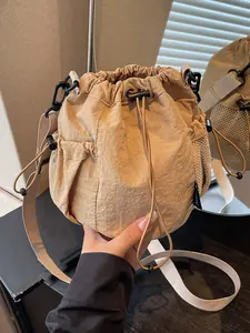 Daily commuting leisure style fashionable drawstring canvas bag, large capacity shoulder crossbody, multi-pocket design, simple and versatile leisure bag, lightweight and practical commuting leisure wear essential bag