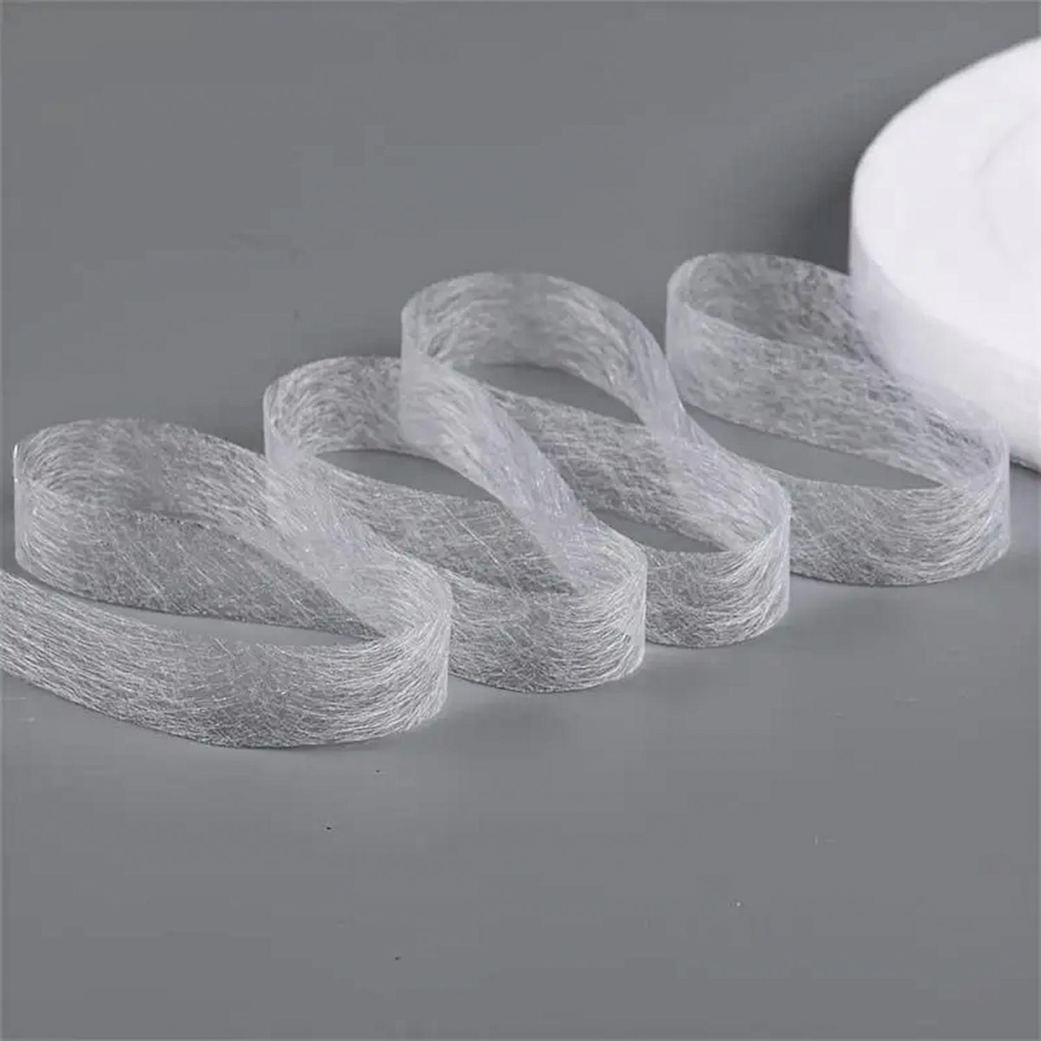 1 x 64 m Iron-On Fabric Fusion Tape with Adhesive Hem for Hemming Broken Clothes, Jeans and Fabric 1 x 64 m Iron-On Fabric Fusion Tape with Adhesive Hem for Hemming Broken Clothes, Jeans and Fabric