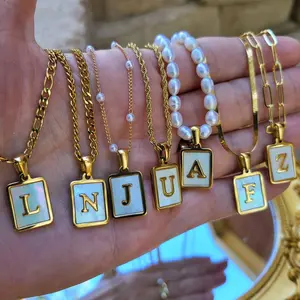 Gold Filled Mother Of Pearl Initial Necklace with 2-inch Extender for Adjustable Fit Handcrafted with Love and Customizable Options for Personalized Elegance