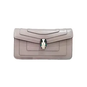 Pre-owned Bvlgari Crossbody Bag in Soft Taupe Leather with Iconic Snake Buckle for Everyday Elegance and Subtle Sophistication