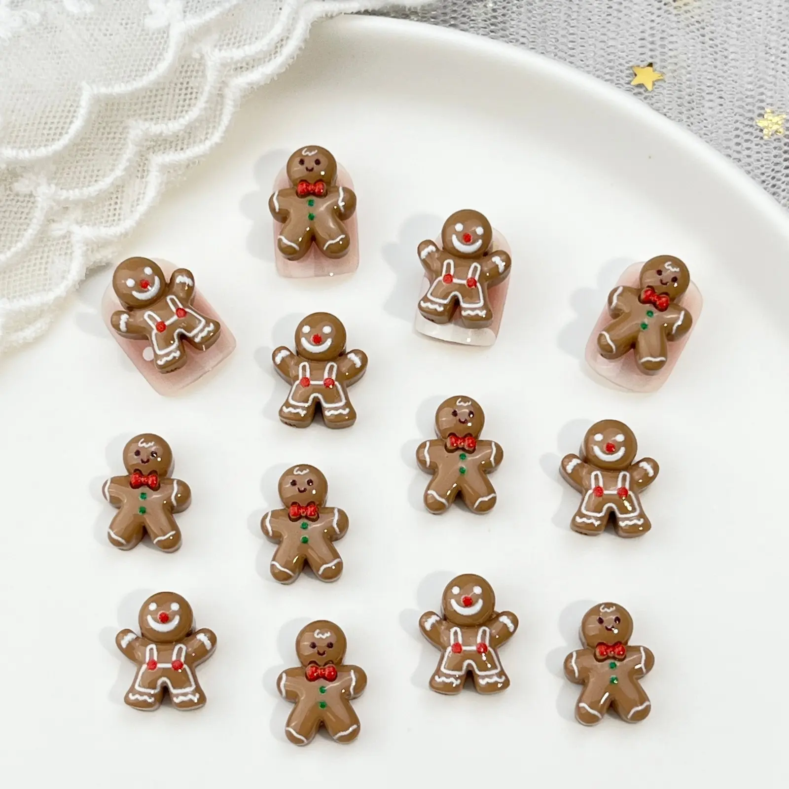 40 Resin Gingerbread Man Set - Mini 3D Flatback Christmas Ornaments with Frosted Beige and Brown Figures, Candy Buttons, and Red Bows. Perfect for DIY crafts, scrapbooking, jewelry making, and nail art.