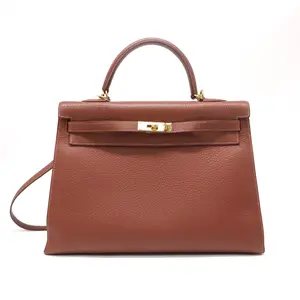 Pre-owned HERMÈS Togo handbag Hermes Kelly Retourne 32 Gold twins LDJ4791