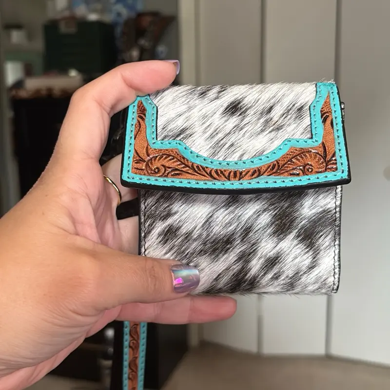 Cowhide and tooled leather card wallet
