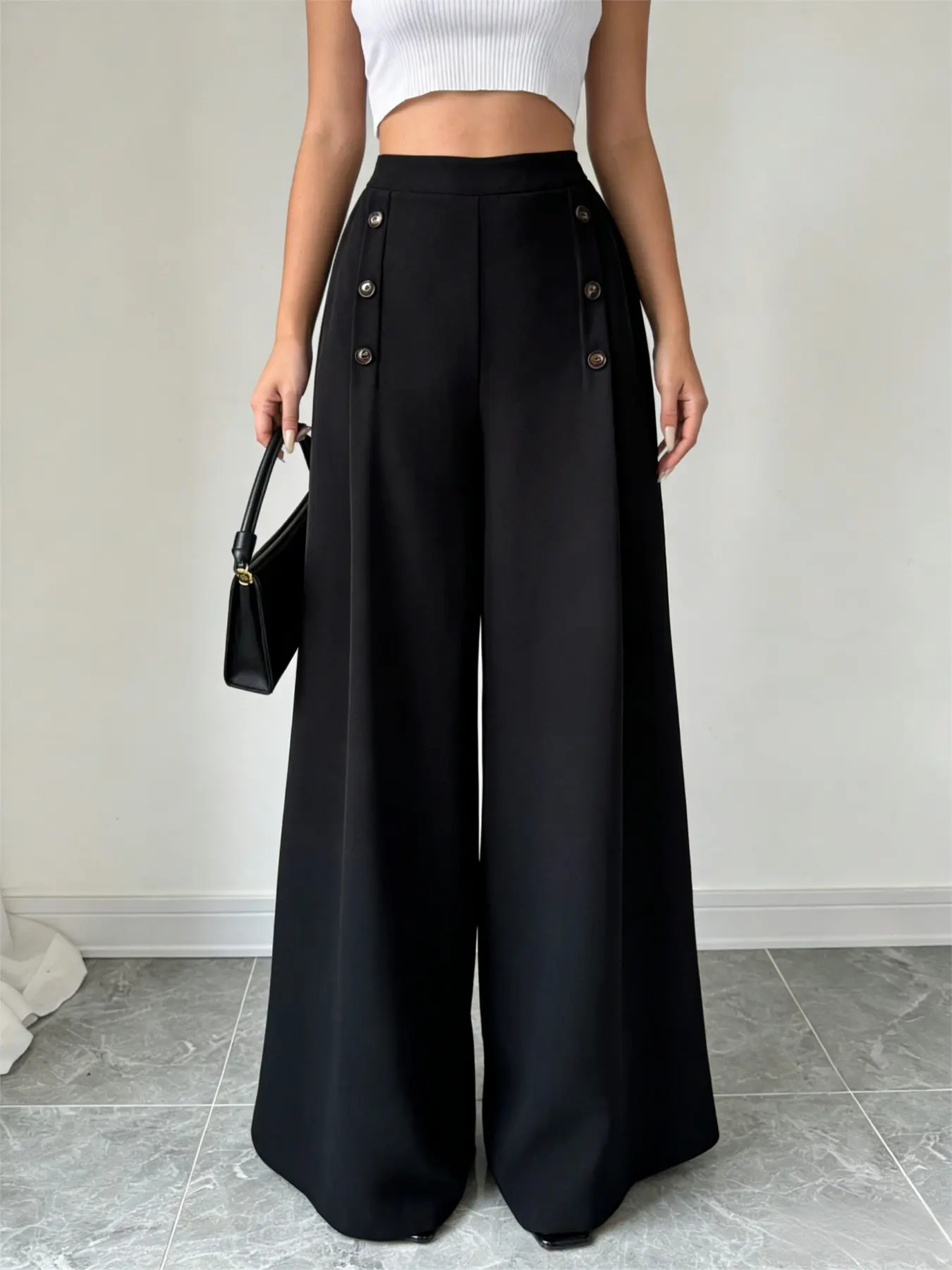 A black high-waisted buttoned Casual dress pants for ladies, with slimming wide legs. Suitable for both commuting and vacation. Wide Legged Pants Womenswear Flowy Wide Leg Loose Palazzo Wide Leg Trousers