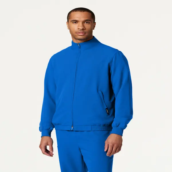 JAANUU Wolfe Men's Classic Fit Plain Knit Scrub Jacket - Natural UltraLAST 4-Way Stretch Fabric (Rayon-Elastane), Workwear Uniform with 6 Pockets, Ribbed Cuffs, 2-Way Zippers, Wrinkle Resistant, Polyester Blend, Interior Locker Loop, Soft-Touch, Scrub Sty