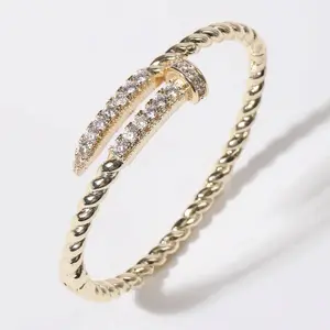 Pave Edge Twisted Gold Plated Bangle Bracelet - 2.5" Diameter, Lead & Nickel Compliant, Luxurious Shine, Versatile Accessory for Everyday Wear or Special Occasions