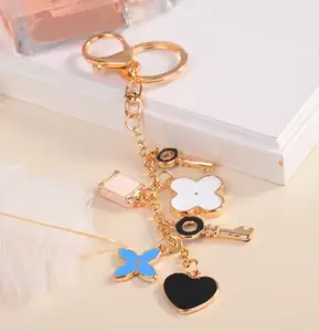 Love Clover Creative Gift Key Chain Alloy Rhinestone Key Chain Bag Pendant Women Handbag Charm Car Accessories Small Gift