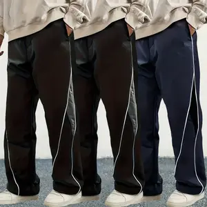 Men's fashion loose-fit pants with side stripe patching. The waist has drawstrings and the bottom has elastic bands, making them perfect for daily casual wear.