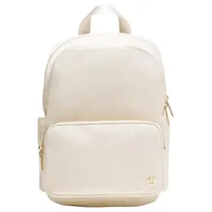 Lululemon Everywhere 11.5L Small Backpack for Women in Light Ivory and Oak Brown with Gold Hardware
