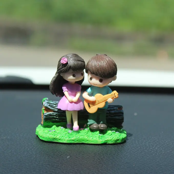 Guitar couple figurine