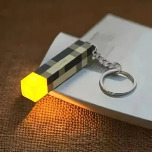 Minecraft Torch Light Keychain Mini Model Pendant with Glowing Feature for Fans Durable Compact Design Ideal for Collectors and Enthusiasts