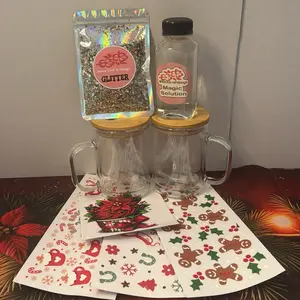 snowglobe mugs start kit- included 2 15oz doble wall glass mugs- 4 uvdtf wraps mixed decal-2 bags of 1.5 glitter- 1 mini funnel-I 8oz magic solution.