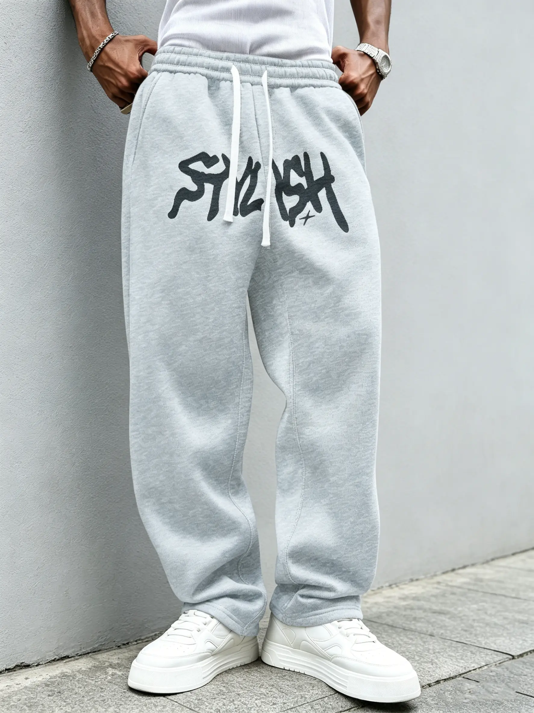 Men’s casual sweatpants, American retro style trendy long sweatpants with letter print design, loose fit with stretch and drawstring waist, suitable for all seasons, street-style fashion loose sweatpants.