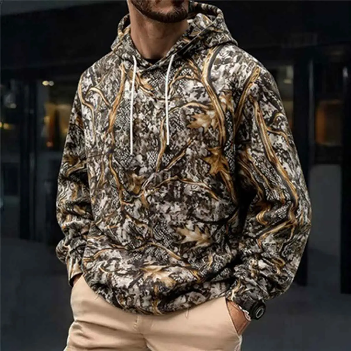 The tough and stylish men's camouflage hooded sweatshirt features a classic jungle pattern and a conventional silhouette, designed specifically for energetic outdoor and urban living Menswear Pullover Tops