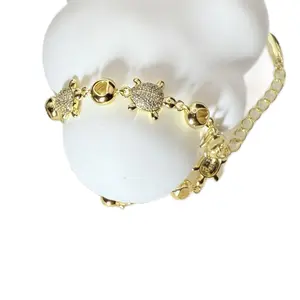 Bracelet Turtle 7.5 Inches Adjustable Cod 7029 Gold-Tone Jewelry Accessory with Turtle Charms