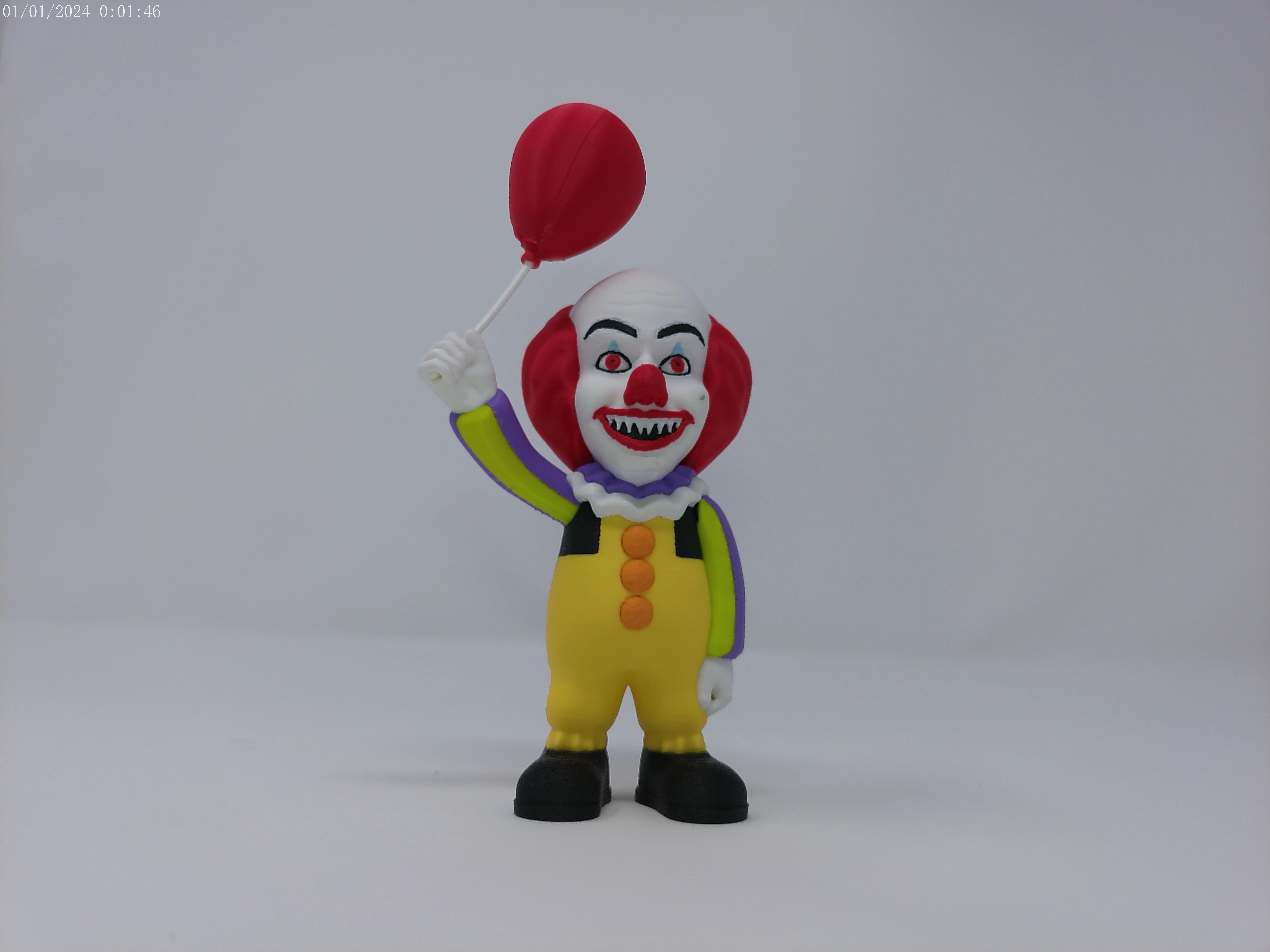 Mini Pennywise Figure - Horror Collectible from IT Figurine, 4-5 Inches Height, With Balloon