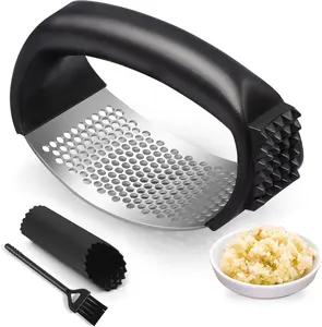 Garlic Press Rocker, Stainless Steel Mincer and Crusher, Easy Squeeze Garlic Tool with Peeler and Cleaning Brush for Smashing Garlic Kitchen Utensils.