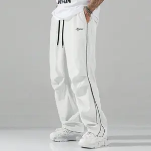 Men's Dark Grey Loose Track Pants, Lightweight Quick-Dry Fabric, Elastic Waist with White Drawstring, White Side Stripe & "Power" Logo, Baggy Streetwear Fit, Ideal for Casual Wear, Urban Style, and Daily Outings, a trendy functional wardrobe staple.