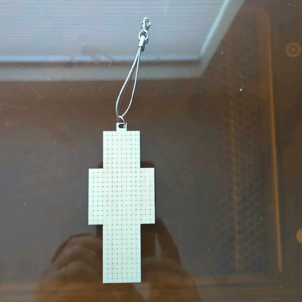 laser cut and marked Minecraft keychain that lets you design your own unique character.