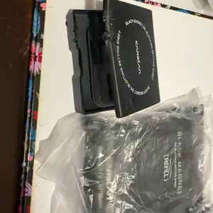 Product Review of CARSLAN Black Magnet Oil Blotting Setting Sheet With Powder More Control Oil Keep Fresh 2 IN 1 Blotting Sheet with Mirror Puff & Recyclable Case 450 Sheets 1 Box 2 Refills from P**o T**a