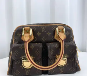 Pre-owned Louis Vuitton Manhattan PM Handbag in Monogram Canvas with Natural Vachetta Leather Trim and Gold Tone Hardware