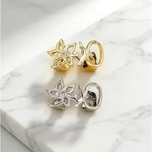 2 PCS Dainty Gold Plated Butterfly Grillz with a sparkling diamond accent, designed for the top teeth. Perfect for adding a feminine, edgy touch to hip-hop, streetwear, and festival looks.