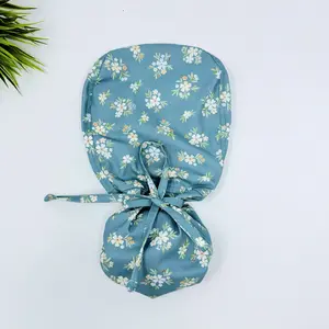 Sage Posies Ponytail scrub cap for women with satin lined option by Paradise Caps.